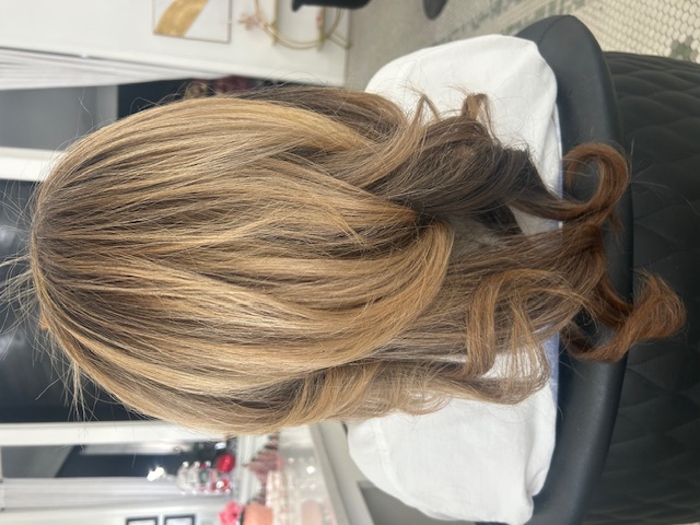 Hair styling work by Audrey's Style Bar