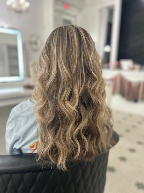 Hair styling work by Audrey's Style Bar