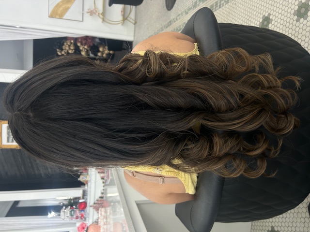 Hair styling work by Audrey's Style Bar