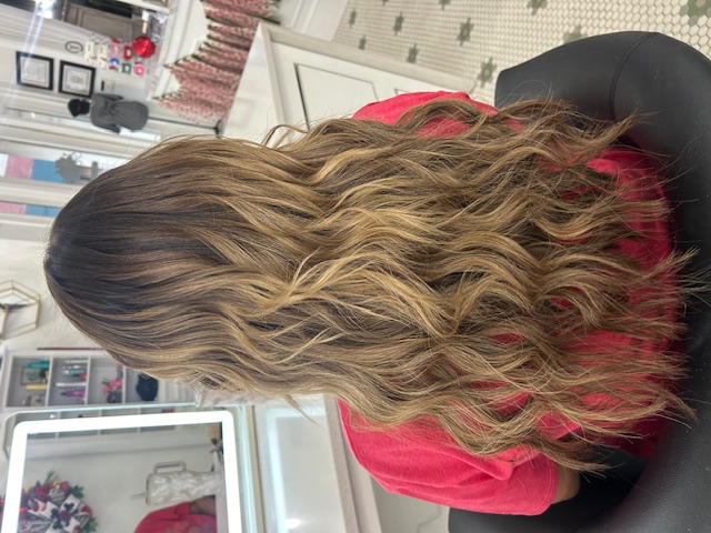 Hair styling work by Audrey's Style Bar