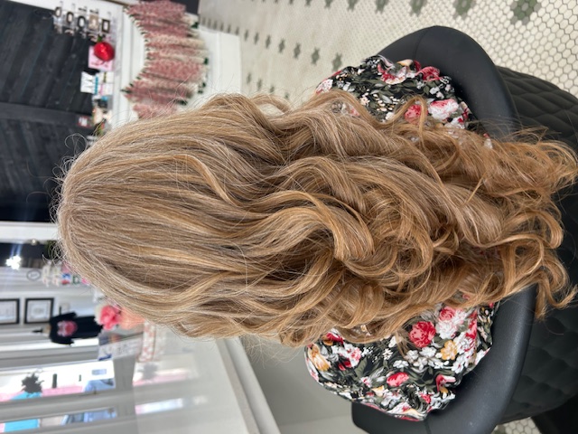 Hair styling work by Audrey's Style Bar